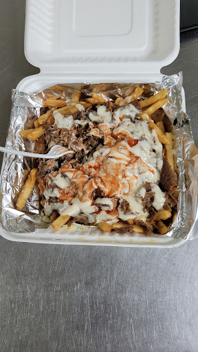 Photo of Cosmic Pizza & Donair and Crispy's Chicken - Fort Saskatchewan - 10441 99 Ave #707, Fort Saskatchewan, AB T8L 0V6